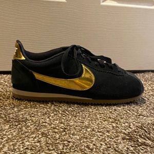 Gold swish Nike Cortez